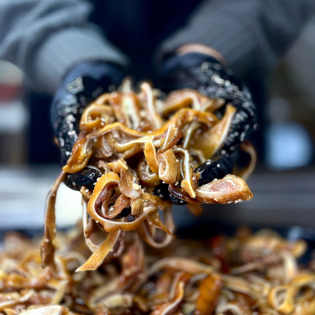 Вуха свинячі копчені з часником